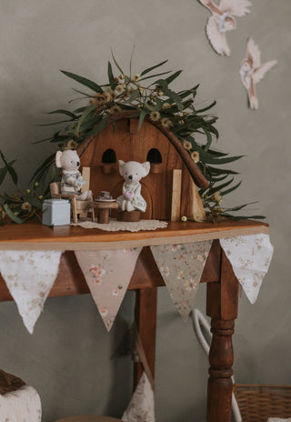 Miniature Rugaroo Koala dolls enjoying pretend play with dollhouse-sized coffee cups — adorable Aussie soft toys for imaginative storytelling.