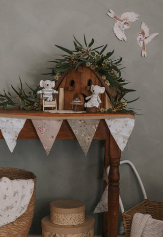 Miniature Rugaroo Koala dolls enjoying pretend play with dollhouse-sized coffee cups — adorable Aussie soft toys for imaginative storytelling.