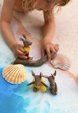 kangaroo dolls on foam play mat