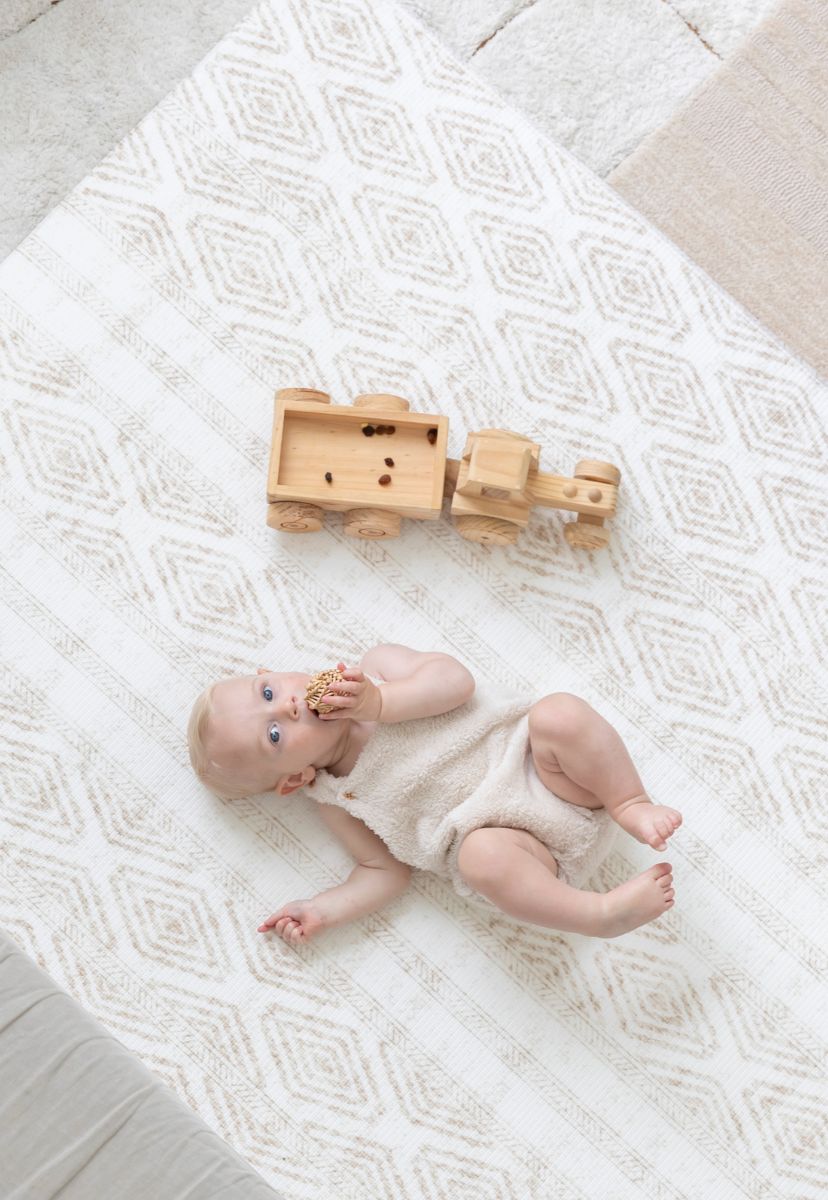 Best Baby Padded Play Mat in Neutral that is waterproof and looks like designer rug