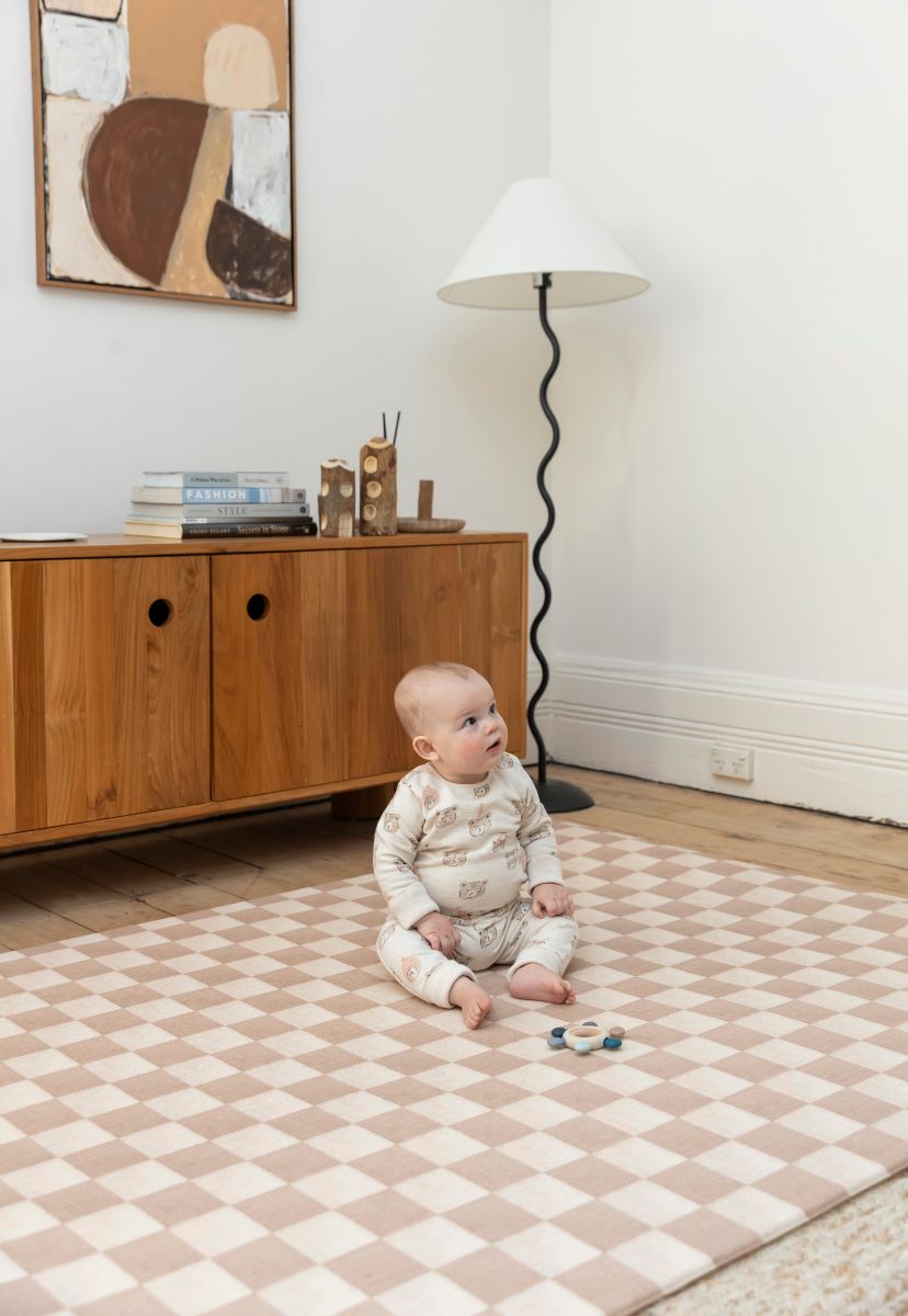 award-winning Neutral checkered double-sided foam padded play mat that looks like rug and is waterproof