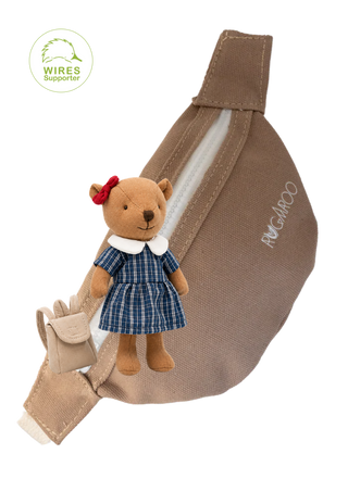 A beige canvas fanny pack with a white zipper, featuring a small plush rugaroo wombat doll with school uniform dress and red bow.