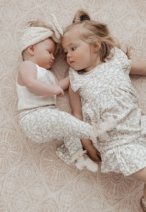 Large Foam Padded Play Mat for babies that look like a woven rug in neutral colours