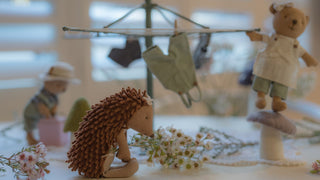 Riva the Echidna, Wazza the Wombat and Marg the Wombat playing around the Rugaroo Backyard Hoist miniature rotary clothesline, Rugaroo dollhouse dolls