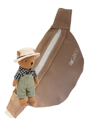 A brown canvas bum bag with a white zipper and embroidered 'RUGAROO' brand name, shown with a small plush farmer wombat doll wearing a hat and overalls attached near the front.
