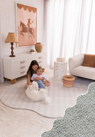 foam padded luxe baby play mat in a puddle shape