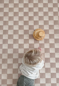 Neutral checkered double-sided foam padded play mat that looks like rug and is waterproof - best selling