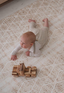 Best Baby Padded Play Mat in Neutral that is waterproof and looks like designer rug