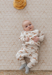 Large Luxe Foam Padded Baby Play Mat that is double sided, non-toxic, waterproof and looks like a stylish rug in neutral colours.
