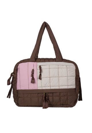 Colour-block baby bag in Clay Dusk with modern panels and premium recycled nylon finish.
