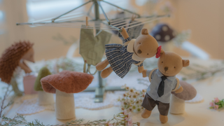 Maisie and Clancy the Prep Wombats hanging from the Rugaroo Backyard Hoist miniature rotary clothesline, Rugaroo Australian animal dollhouse dolls