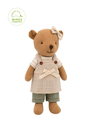 A small plush rugaroo wombat doll with a warm tan-brown body, wearing a cream-colored apron over a striped shirt, olive green pants, and a cream bow on its head, isolated on a white background.