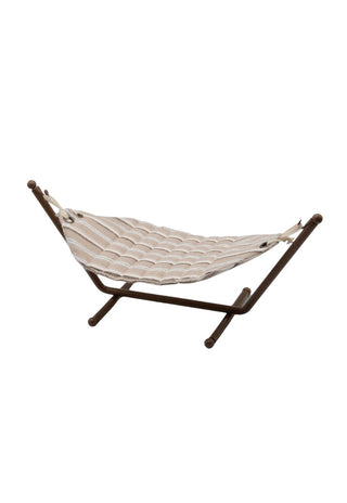 miniature dollhouse hammock with stand on a white background