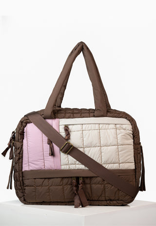 Front view of Clay Dusk nappy bag with bottle holders and adjustable strap.