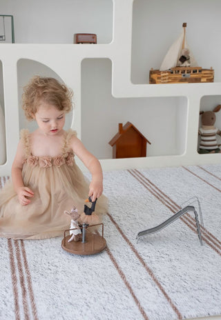 Neutral nursery scene with Rugabub Cala striped non toxic foam baby play mat.