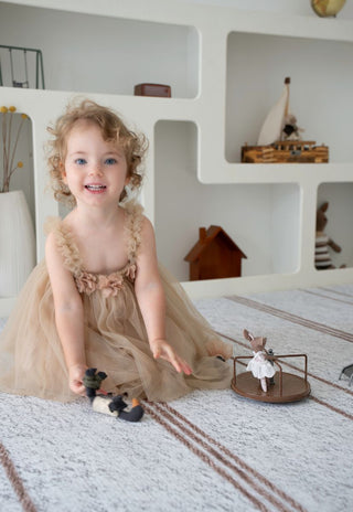 Modern nursery with Rugabub Cala neutral striped non toxic foam baby play mat.