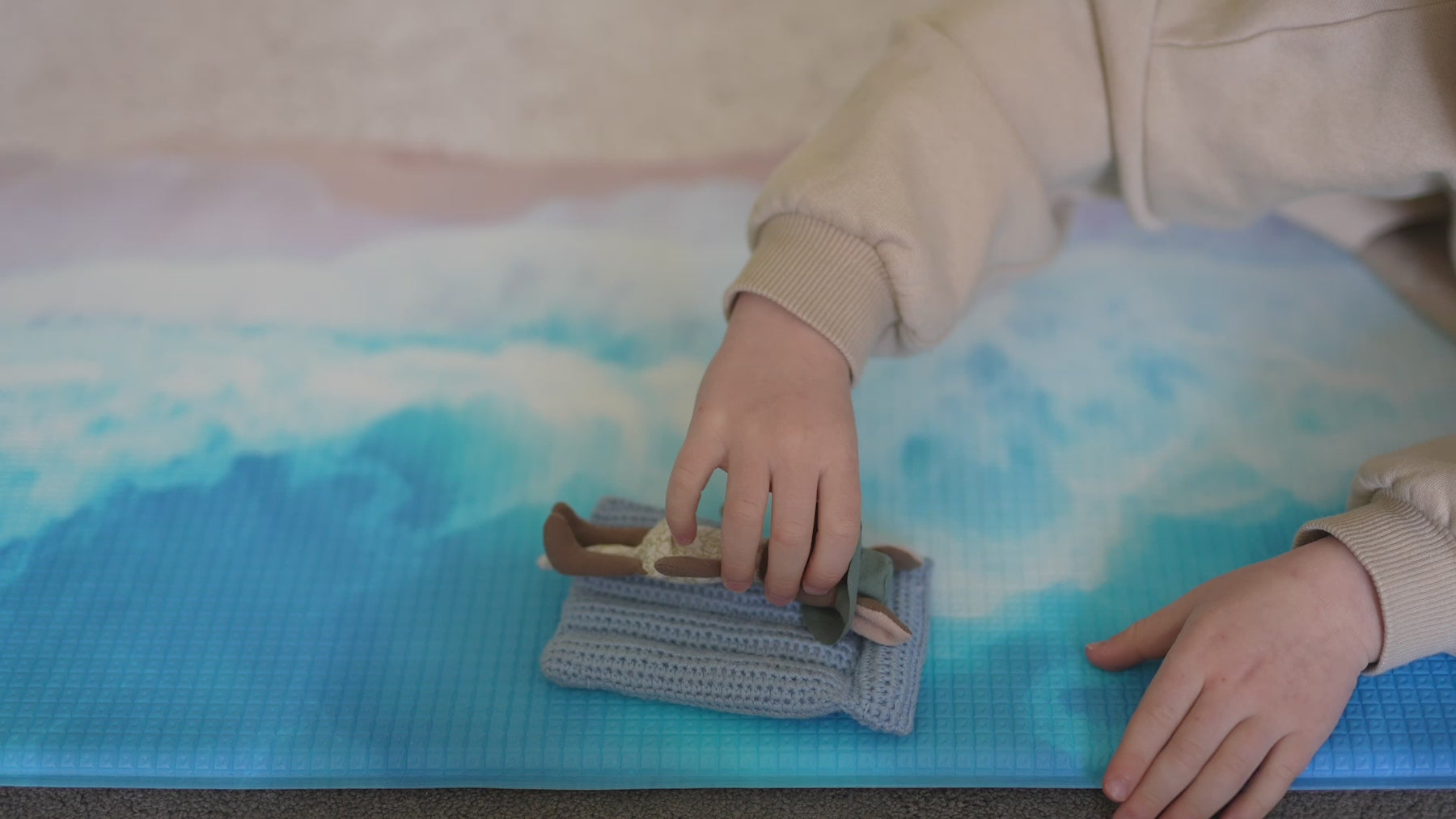 Baby Play Mat that has a road rack and ocean