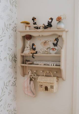 Rugaroo Black Swan heirloom plush dolls styled on a vintage nursery shelf in a children's bedroom - Australian collectible miniature toys as room decor