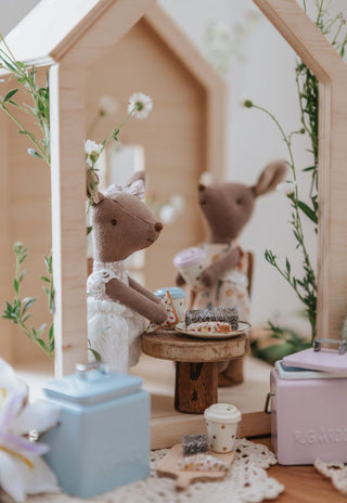 A miniature Rugaroo Kangaroo doll holding a tiny esky filled with fairy bread, adding a touch of Aussie charm to playtime