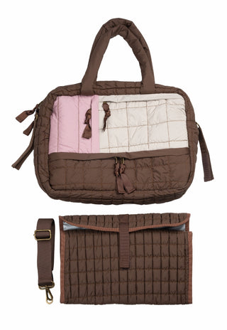 Soft neutral Clay Dusk baby bag attached to pram with matching accessories.